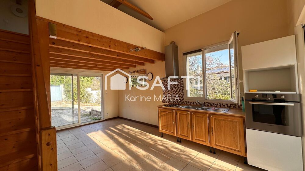 Vente Maison 13400 - AUBAGNE - Propriété de 242 m2 sur un terrain plat de 4643 m2 avec dépendances, piscine et garage Aubagne
