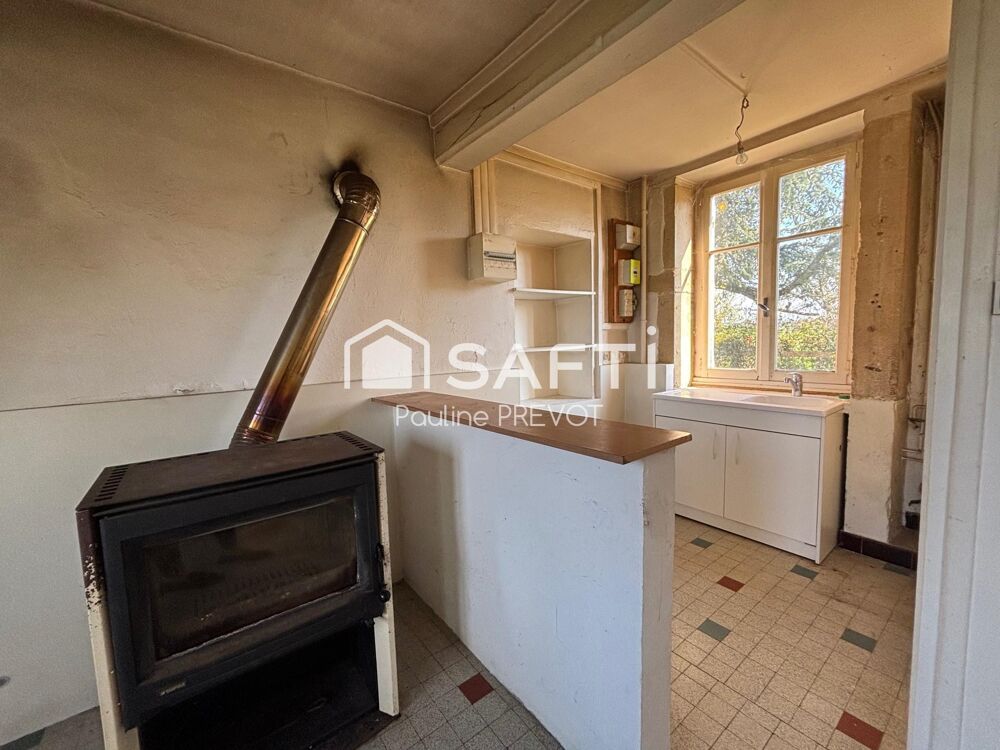 Maison de campagne avec vue dégagée, 3 chambres et beau potentiel.