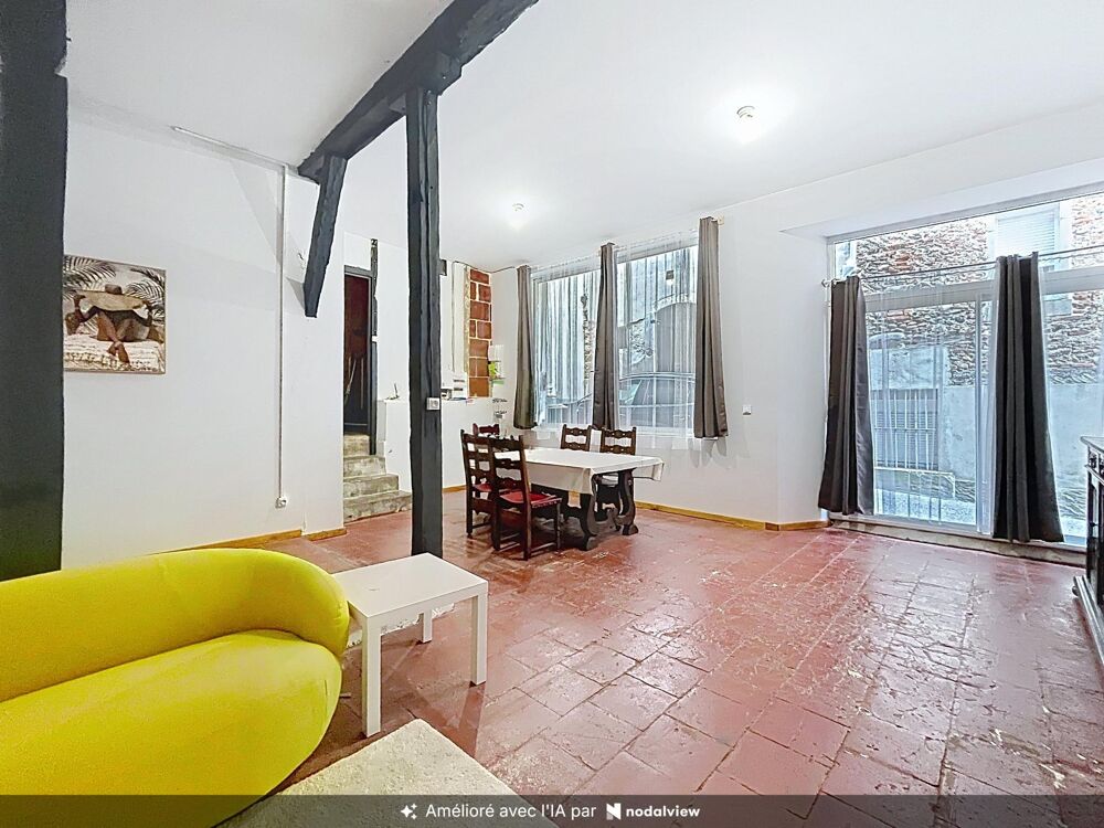 Maison de ville de 126 m² avec garage, cour intérieure.