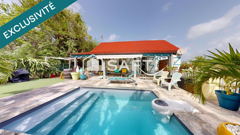 Vente Maison Maison sur deux niveaux, F4 et deux F2, piscine Sainte-anne