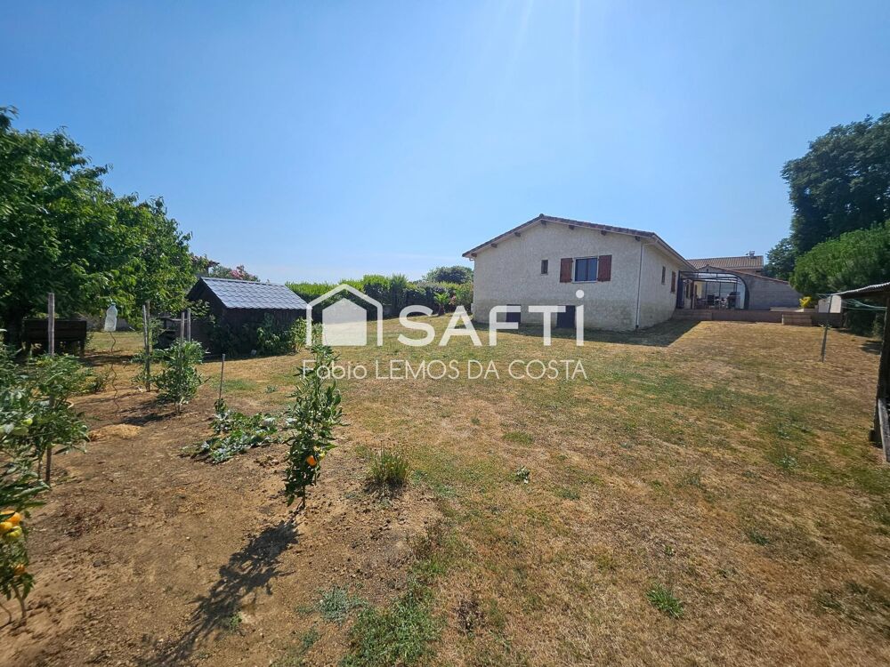 VILLA DE PLAIN PIED AVEC GARAGE ET JARDIN CLÔTURÉE