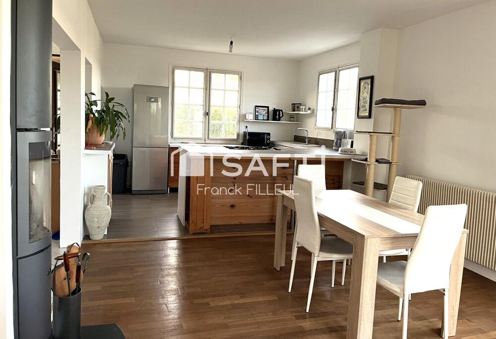 Maison familiales avec 2 garages dans parc clos