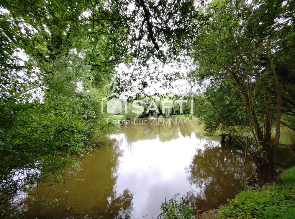 Vente Terrain Terrain de loisirs avec étang et mobil-home – 4100 m² clos à Houssay (53360) Houssay