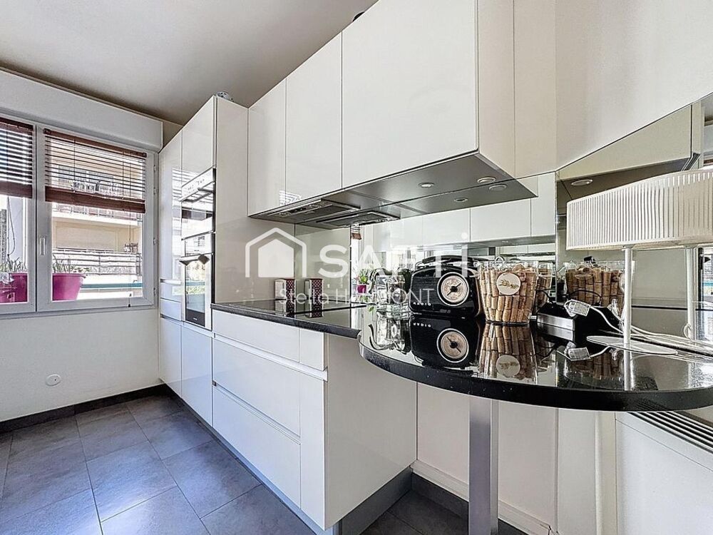 Vente Appartement 4P avec 3 chambres, un balcon et une place de parking en sous-sol Asnieres-sur-seine