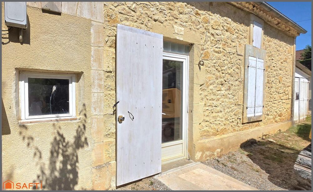 Ensemble immobilier composé de deux maisons de plain-pied à finir et jardin.