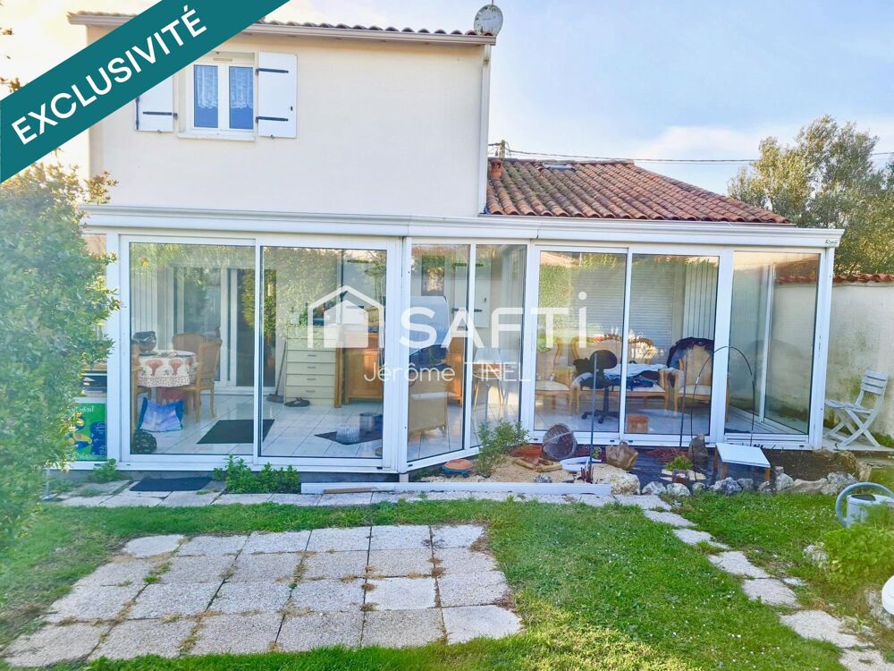 Maison familiale avec véranda, jardin et garage