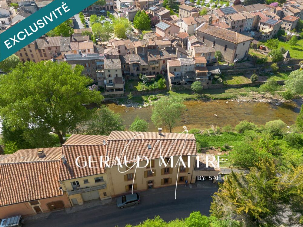 Maison de village 5 ch avec jardin et garage, vue sur la rivière.