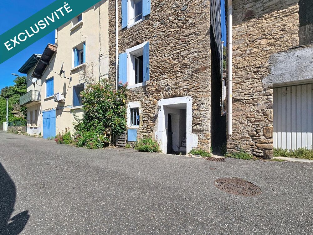 Une authentique maison en pierre avec vue sur la rivière, au coeur dun hameau préservé des Hauts Cantons.