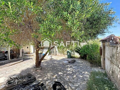   Maison de ville avec extérieur et garages à renover Maison - 5 pièce(s) - 140 m²