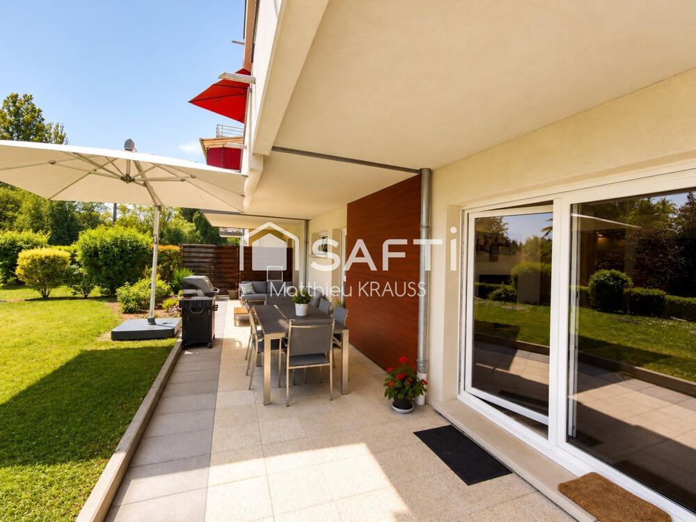 Rez-de-jardin, terrasse 50m² et jardin privatif