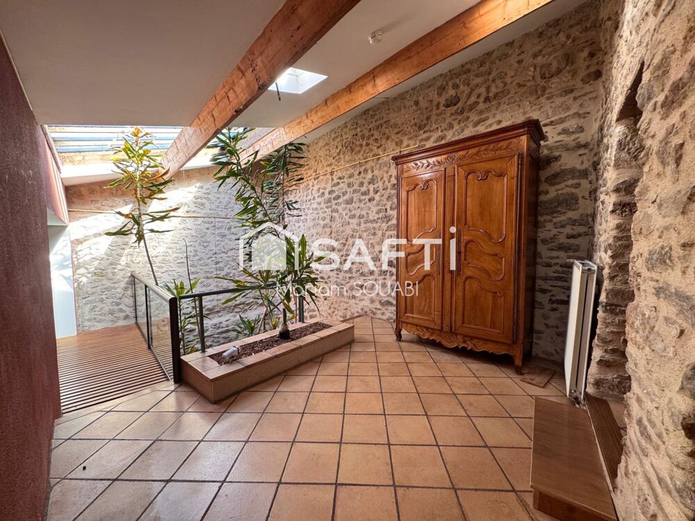 Vente Maison Maison de caractère 220m2, jardin, terrasse, places de parking privatives Clermont-l'herault