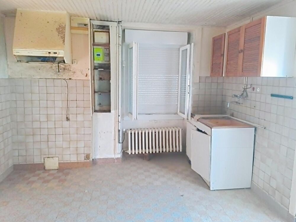 Maison à rénover avec beau potentiel
