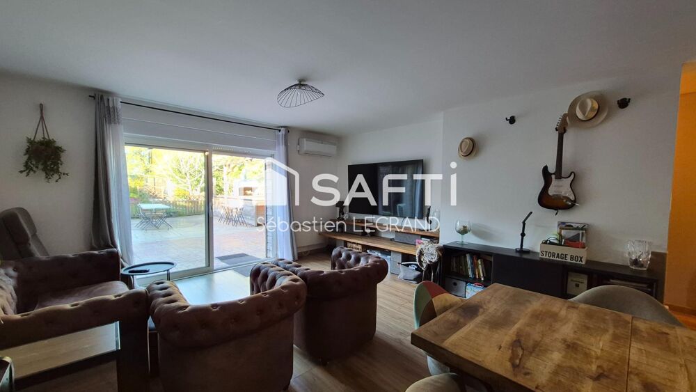 Appartement 3 chambres avec jardin, cave et parkings