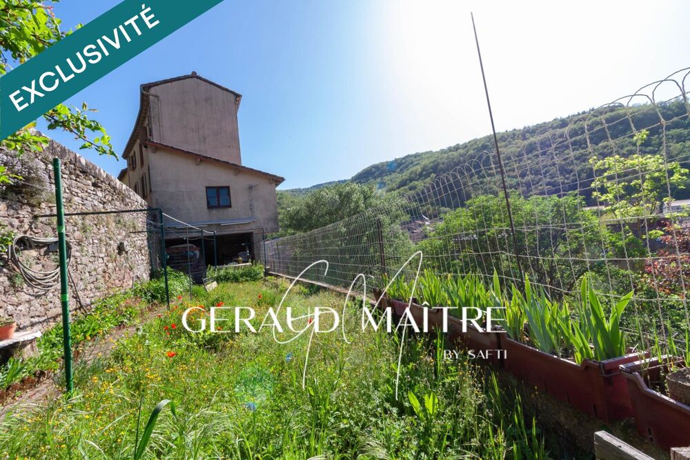 Maison de village 5 ch avec jardin et garage, vue sur la rivière.