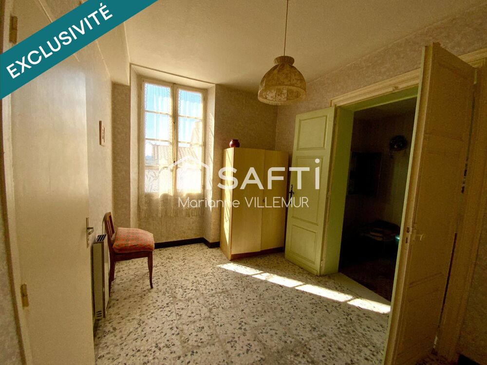 Maison de ville d'environ 140 m² habitables  Fort potentiel à Mézin