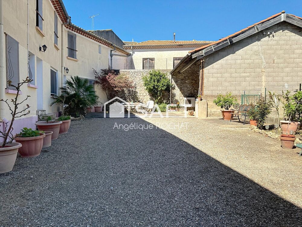 Vente Maison Grande bâtisse + 500m2 garage 190m2 + grenier 150m2  au centre de Magalas Magalas