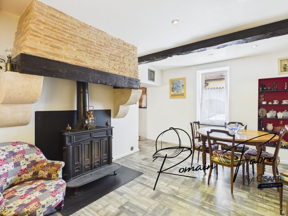 Maison en pierre de 131 m2 avec 3 chambres, grande terrasse couverte et arrière chai, au calme
