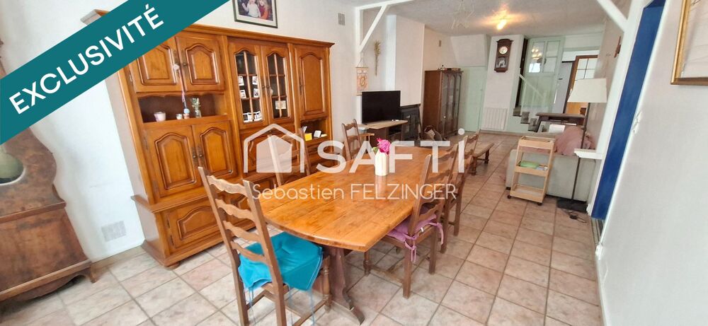 Ensemble immobilier situé dans le village très prisé de Bruyères-et-Montbérault !