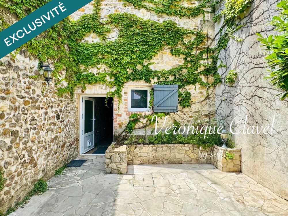 Maison de village en pierre apparentes de 110m2 récemment rénovée avec patio et Garage de 40m2