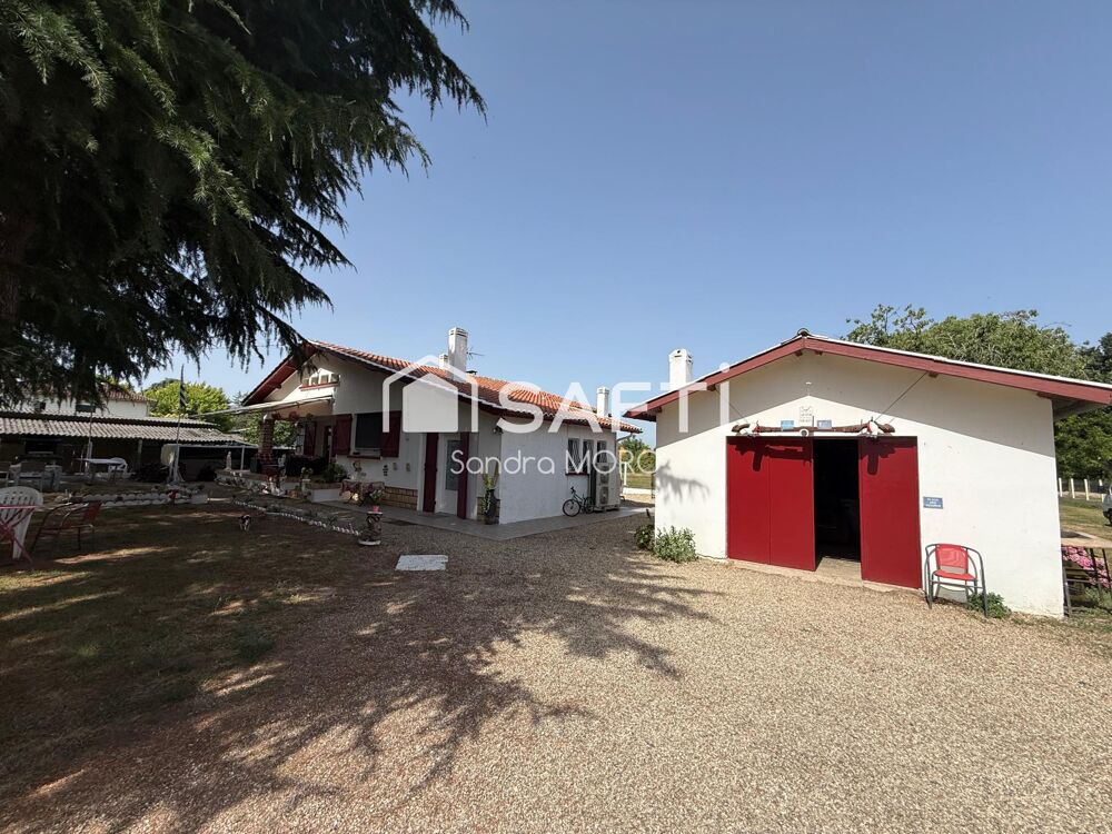 Maison de plain-pied avec grand terrain, garage et beau potentiel daménagement