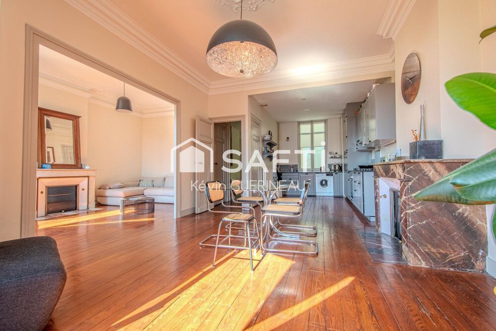 Appartement de standing Triangle d'or 112m2 au dernier étage d'un immeuble classé