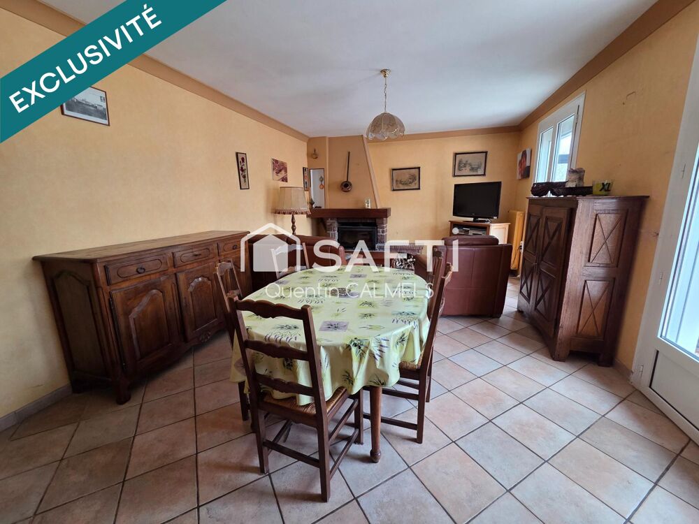 Ensemble immobilier à Nuces , maison de plain-pied et local commercial loué