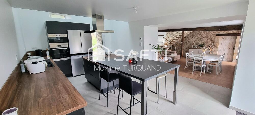 Longère rénovée 100m², 2 chambres, 1 bureau, dépendances.