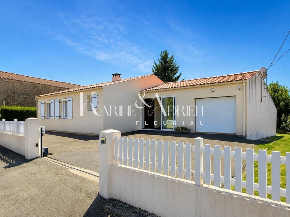 Maison de plain-pied 2 chambres, véranda, garage, dépendance et jardin clos