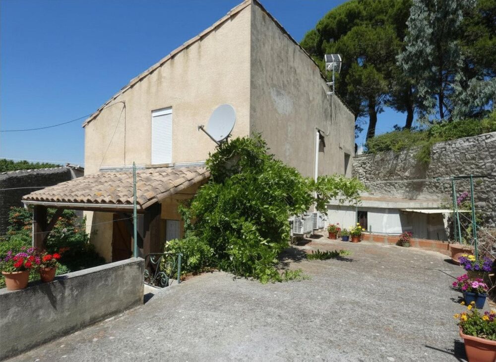 Maison de village 130m² + remise, 4 chambres, garage, terrasse et jardin
