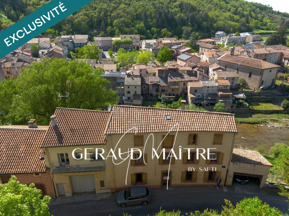 Maison de village 5 ch avec jardin et garage, vue sur la rivière.