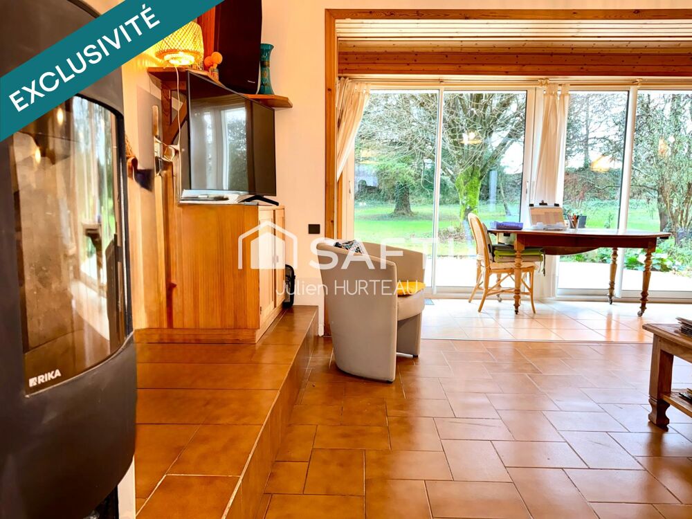 Maison de plain-pied 3 chambres, 2 garages et cave