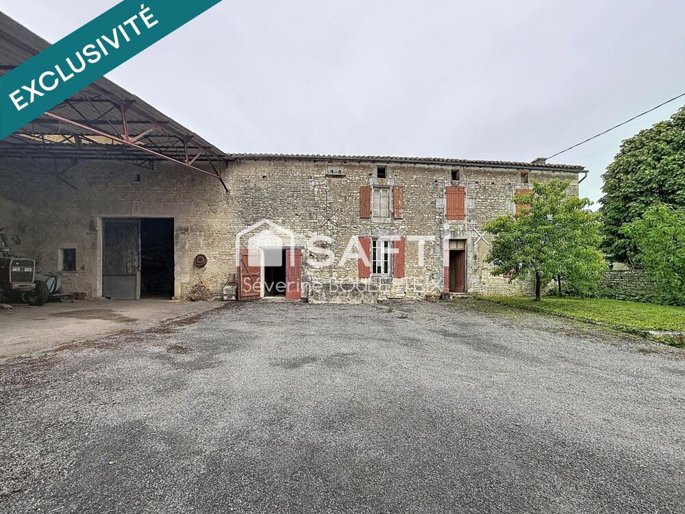 Maison en pierre avec grange attenante