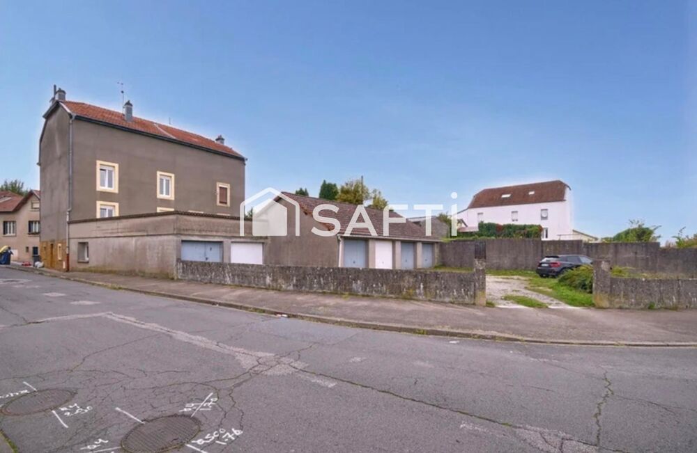 APPARTEMENT STYLE MAISON A RENOVER AVEC POSSIBLITE DIVISION APPARTEMENT 7 GARAGES JARDIN