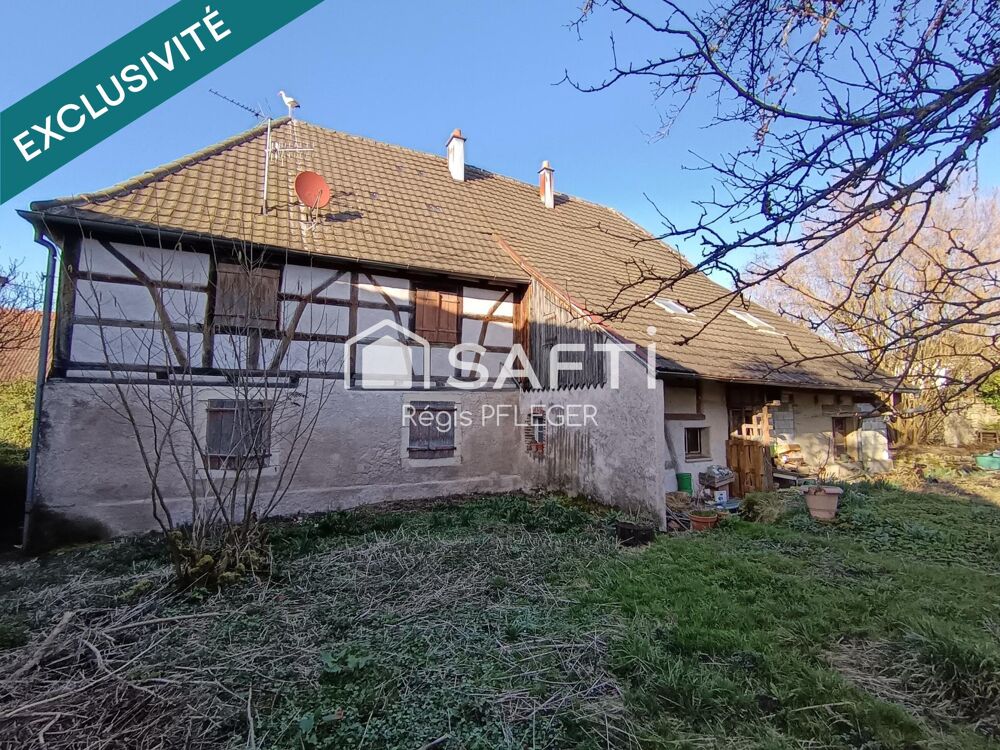 Maison de caractère avec beau potentiel