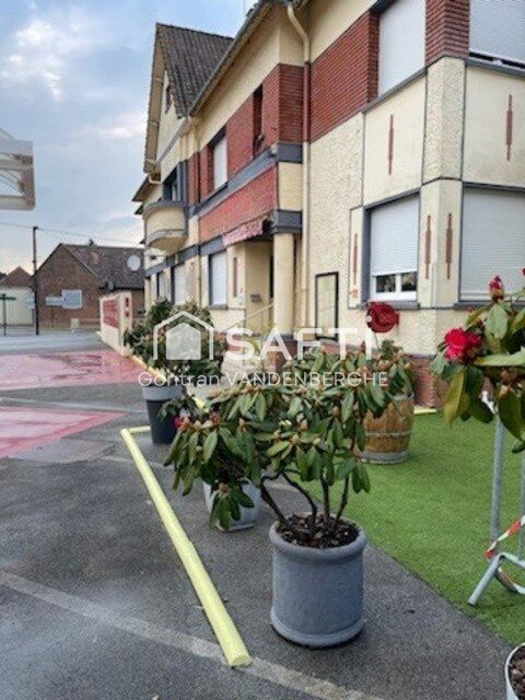 Ensemble immobilier avec commerces , hangar, appartements et une maison 577000 62960 Beaumetz-les-aire