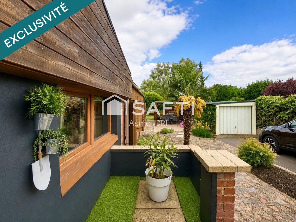 Maison individuelle avec 1 295 m² de terrain arboré