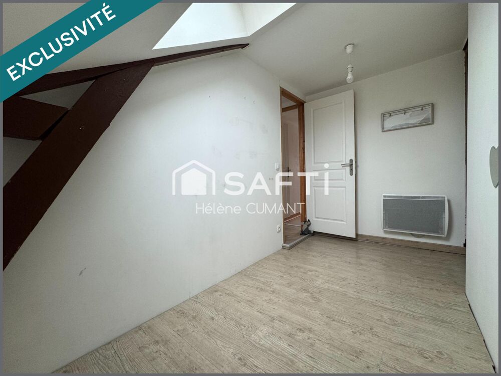 Duplex avec grand garage en plein coeur de Lisieux, au calme absolu à deux pas des commerces.