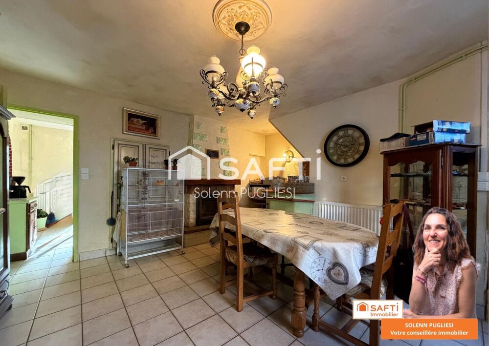Maison de village avec garage et terrain