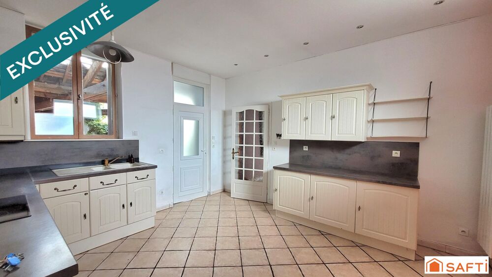 MAISON T6 de 143m² en CENTRE VILLE avec commodités de plain-pied, grande terrasse et accès véhicule