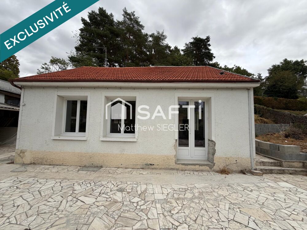 Maison de 80 m² avec 2 chambres, dépendance, atelier et 2 garages, dont un de 40 m² : un bien plein de potentiel pour réaliser v