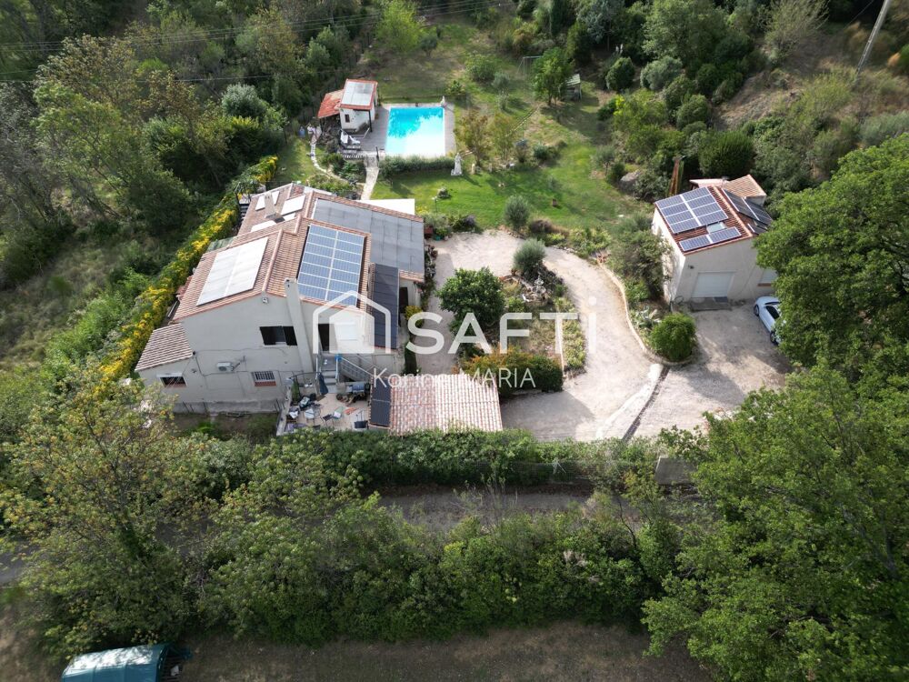 Vente Maison 13400 - AUBAGNE - Propriété de 242 m2 sur un terrain plat de 4643 m2 avec dépendances, piscine et garage Aubagne
