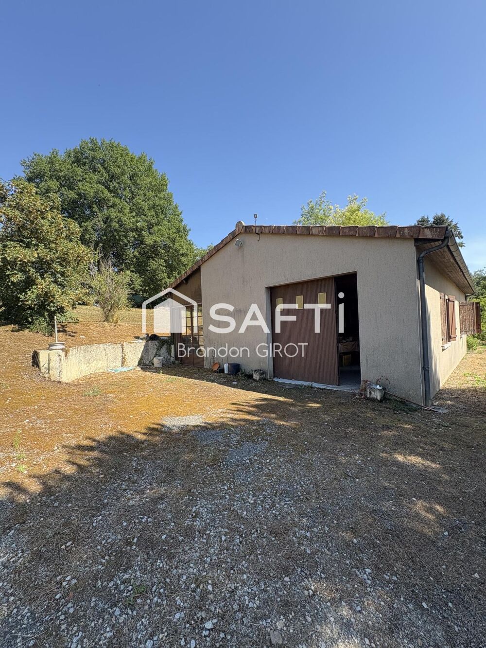 Maison avec beaucoup de terrain