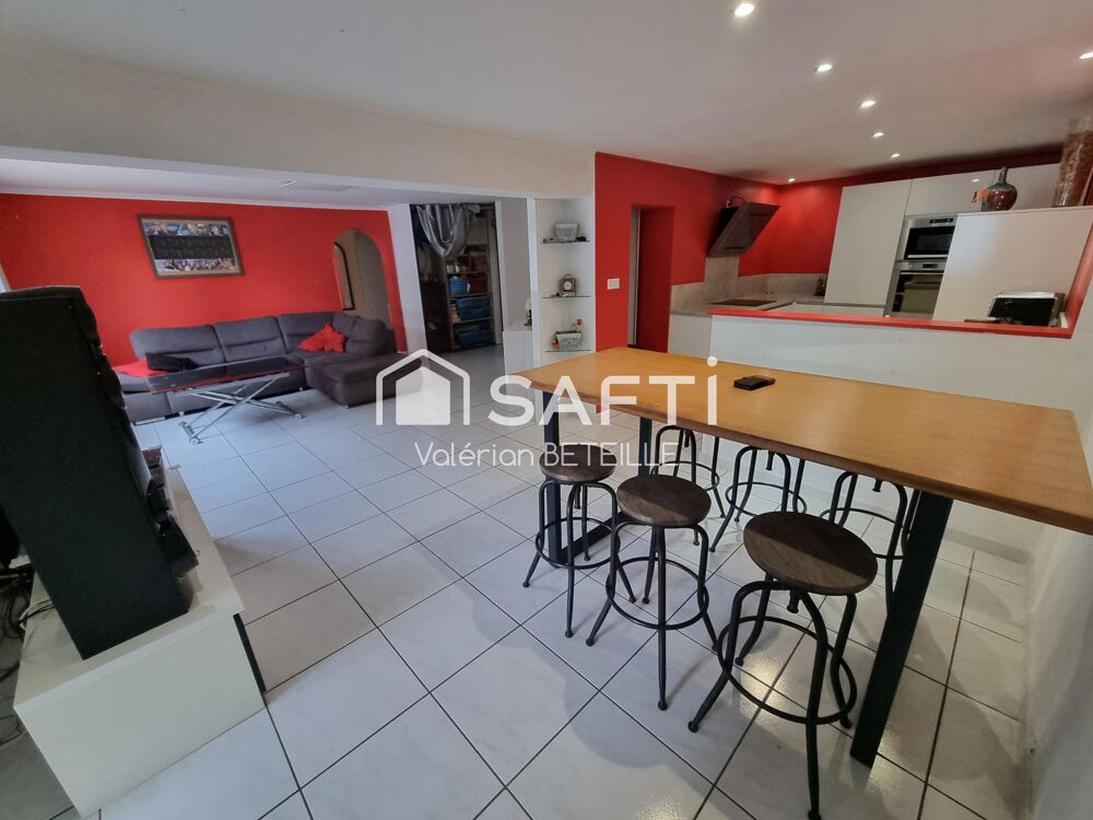 Grande maison avec terrain constructible