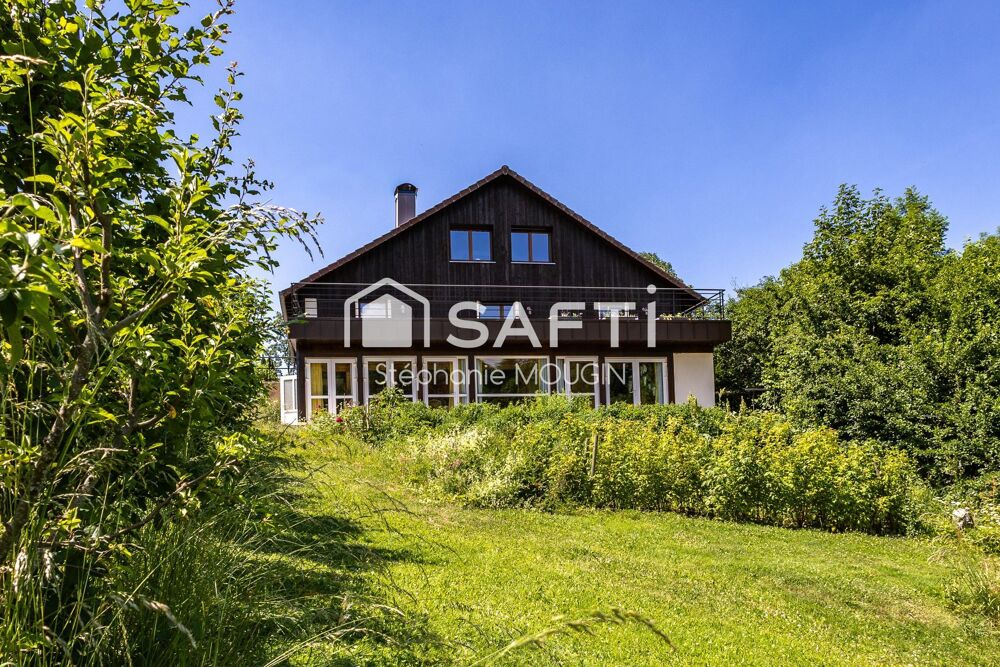 Vente Maison Propriété d'exception au cœur du Pays Horloger – Un domaine unique de plus de 805 m² habitables dans un ecrin de verdure. Le russey