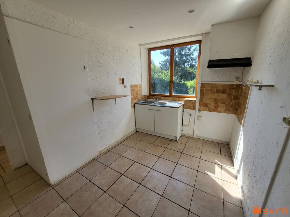 Maison 3 pièces de 50 m² avec terrain de 615 m² et dépendances