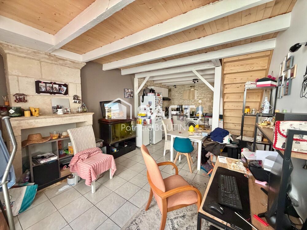 3 MAISONS EN PIERRE AVEC UNE COUR ET CABANONS A NIORT !