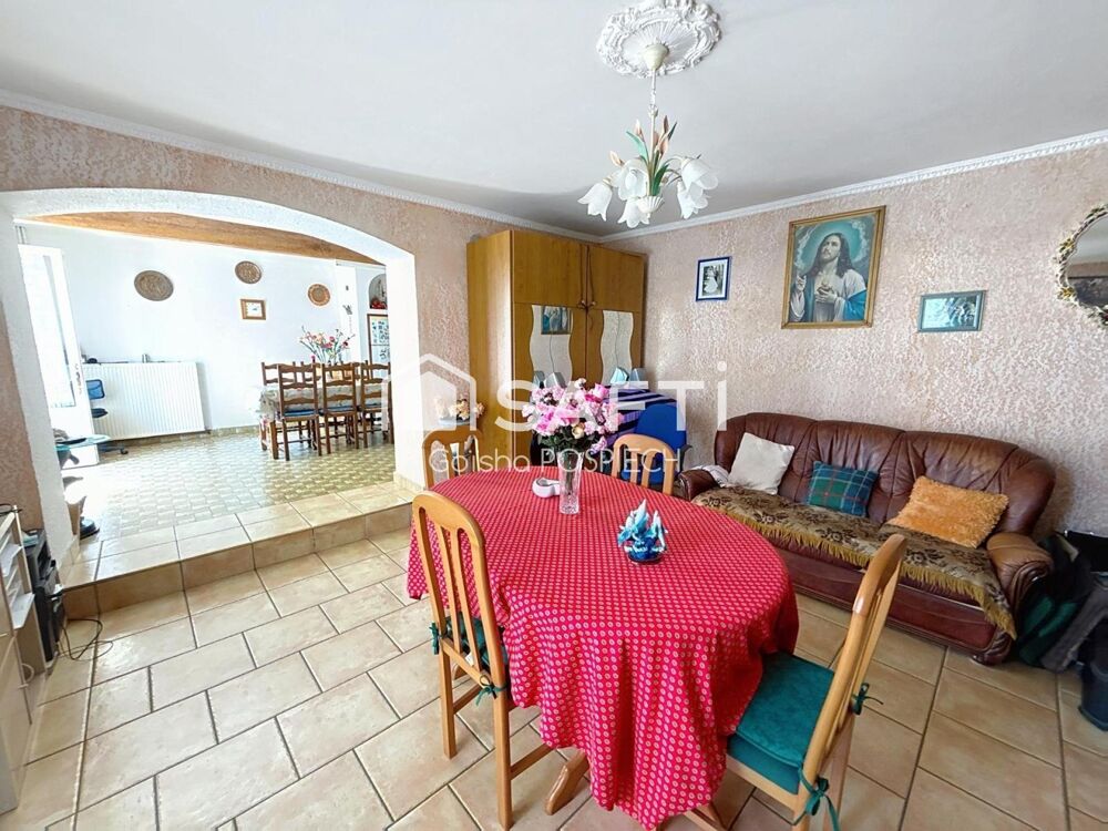 MAISON FAMILIALE AVEC DÉPENDANCE ET GRAND GARAGE  ENVIRONNEMENT PAISIBLE