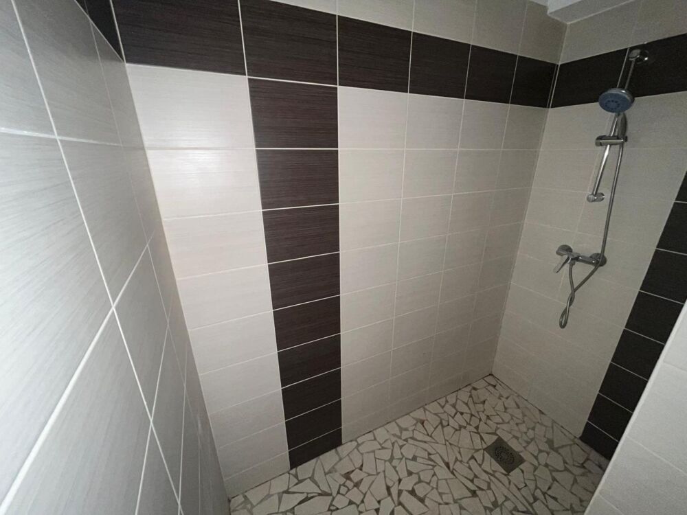 Location Appartement T2 au rez de chaussée d'un immeuble bien situé 38460 CREMIEU Cremieu