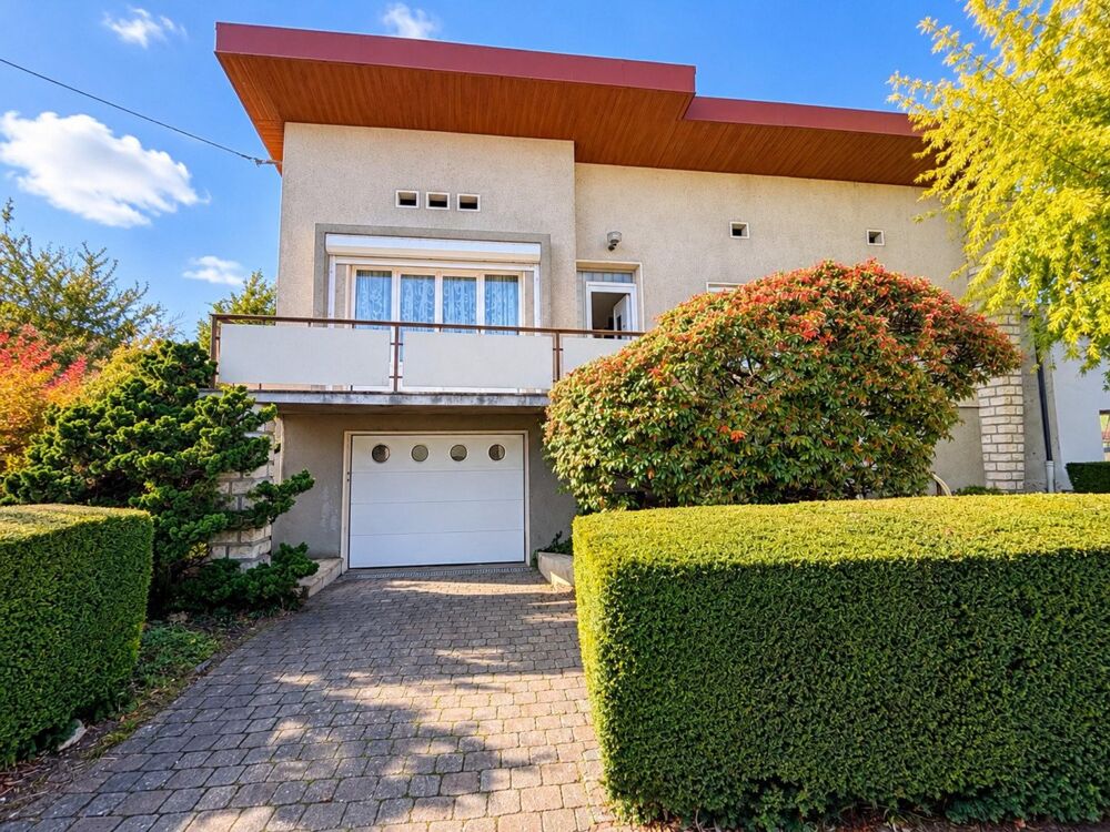 Maison familiale 4 chambres avec ascenseur, véranda et sous-sol complet