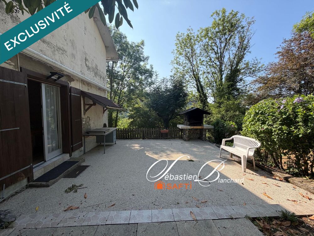 Maison mitoyenne avec beau terrain de 825 m²  à personnaliser
